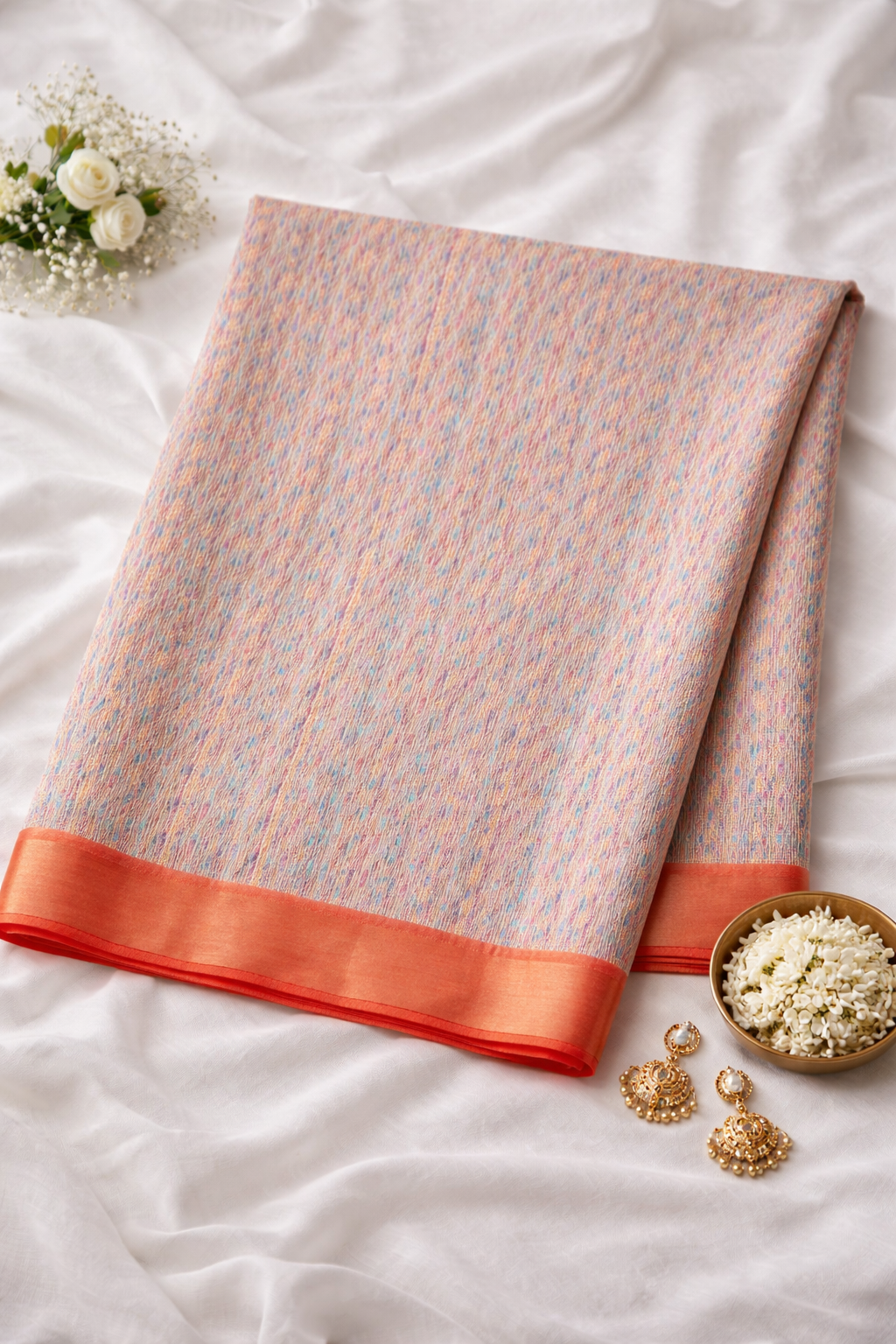 Pastel Floral Printed Soft Organza Saree with Tassel Border